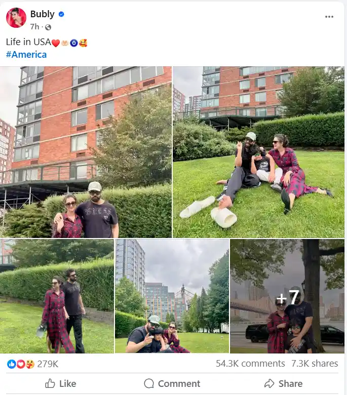 A couple relaxes on a grassy lawn in front of a red brick building. They appear happy, enjoying the outdoors on a cloudy day, with urban scenery around.